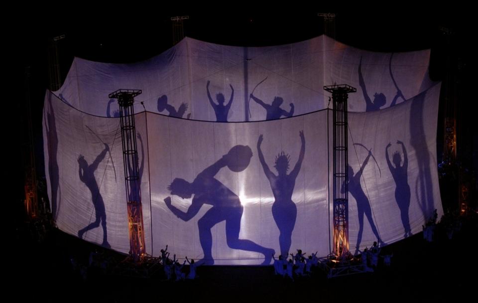 19 Jul 1996: Silhouettes of ancient greek athletes during the Opening Ceremony of the 1996 Olympic Games in Atlanta, Georgia. \ Mandatory Credit: David Taylor  /Allsport