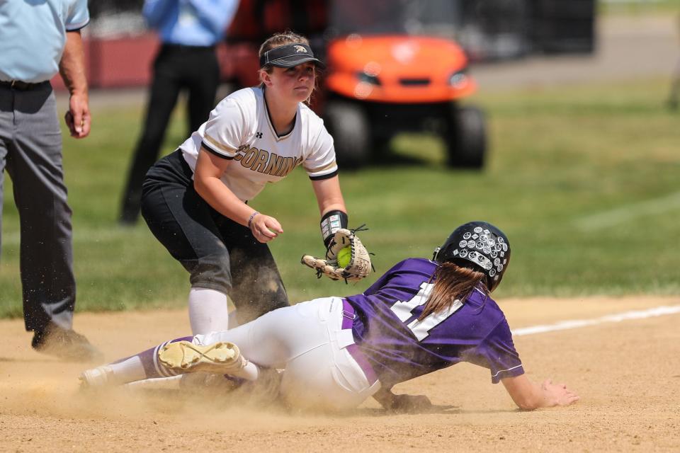 Lily MacNeal from Corning puts the tag on Maddy Bendix from Monroe-Woodbury during the Hawks' 13-2 loss in a NYSPHSAA Class AA softball regional semifinal May 30, 2023 at Union-Endicott.