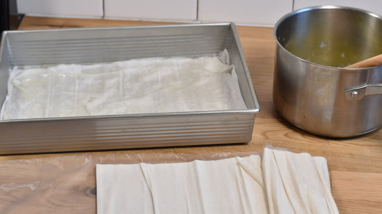 layers of phyllo in baking dish