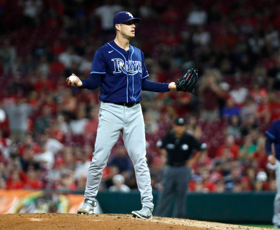 Jul 8, 2022; Cincinnati, Ohio, USA; Tampa Bay Rays relief pitcher Matt Wisler (37) reacts being called for a balk that led to giving up the winning run to the Cincinnati Reds in the tenth inning at Great American Ball Park. Mandatory Credit: David Kohl-USA TODAY Sports