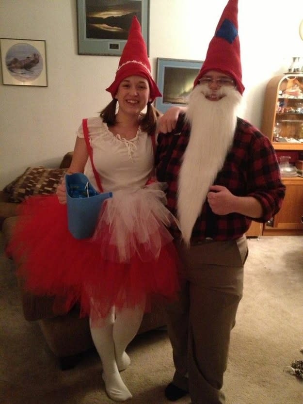 People dressed as lawn gnomes with fake beards and long, pointy hats