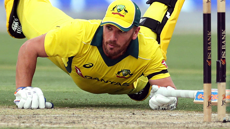 Aaron Finch in action during the third one day international. (Photo by MAHMOUD KHALED/AFP/Getty Images)