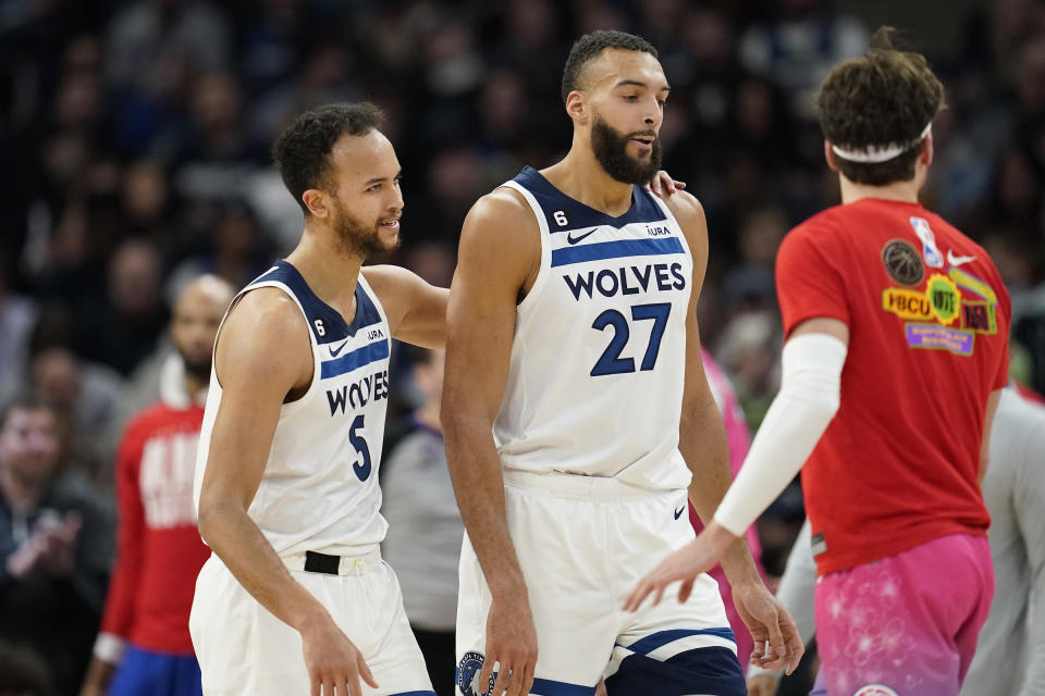 Minnesota Timberwolves forward Kyle Anderson and Rudy Gobert