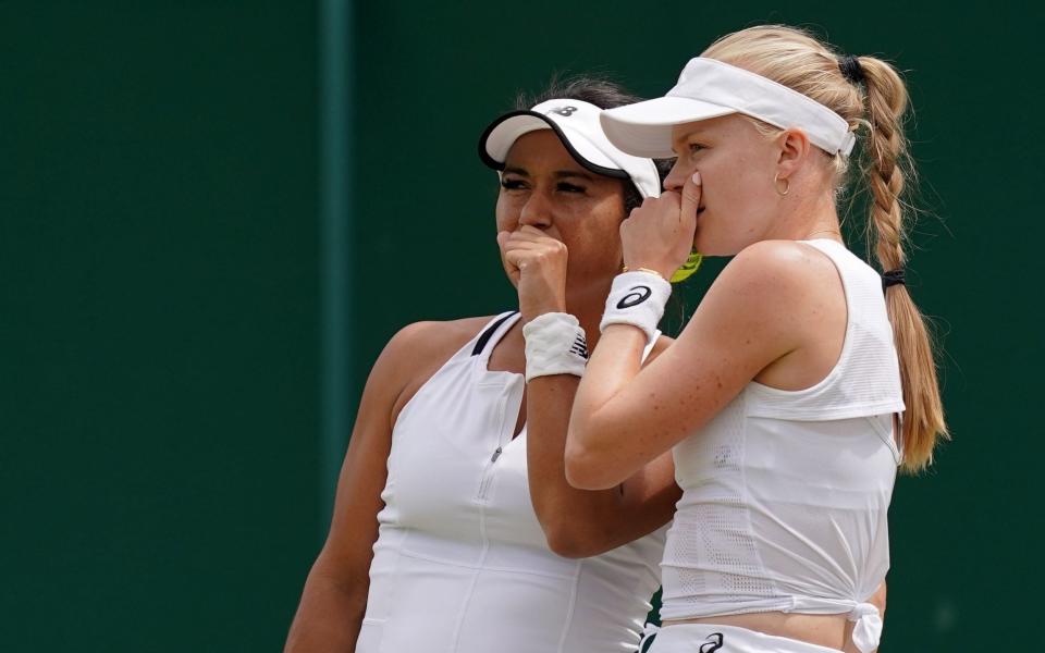 Great Britain's Heather Watson and Harriet Dart (right) in action during their Women's doubles match against Georgia's Natela Dzalamidze and Serbia's Aleksandra Krunic during day six of the 2022 Wimbledon Championships at the All England Lawn Tennis and Croquet Club, Wimbledon. Picture date: Saturday July 2, 2022. - Zac Goodwin/PA