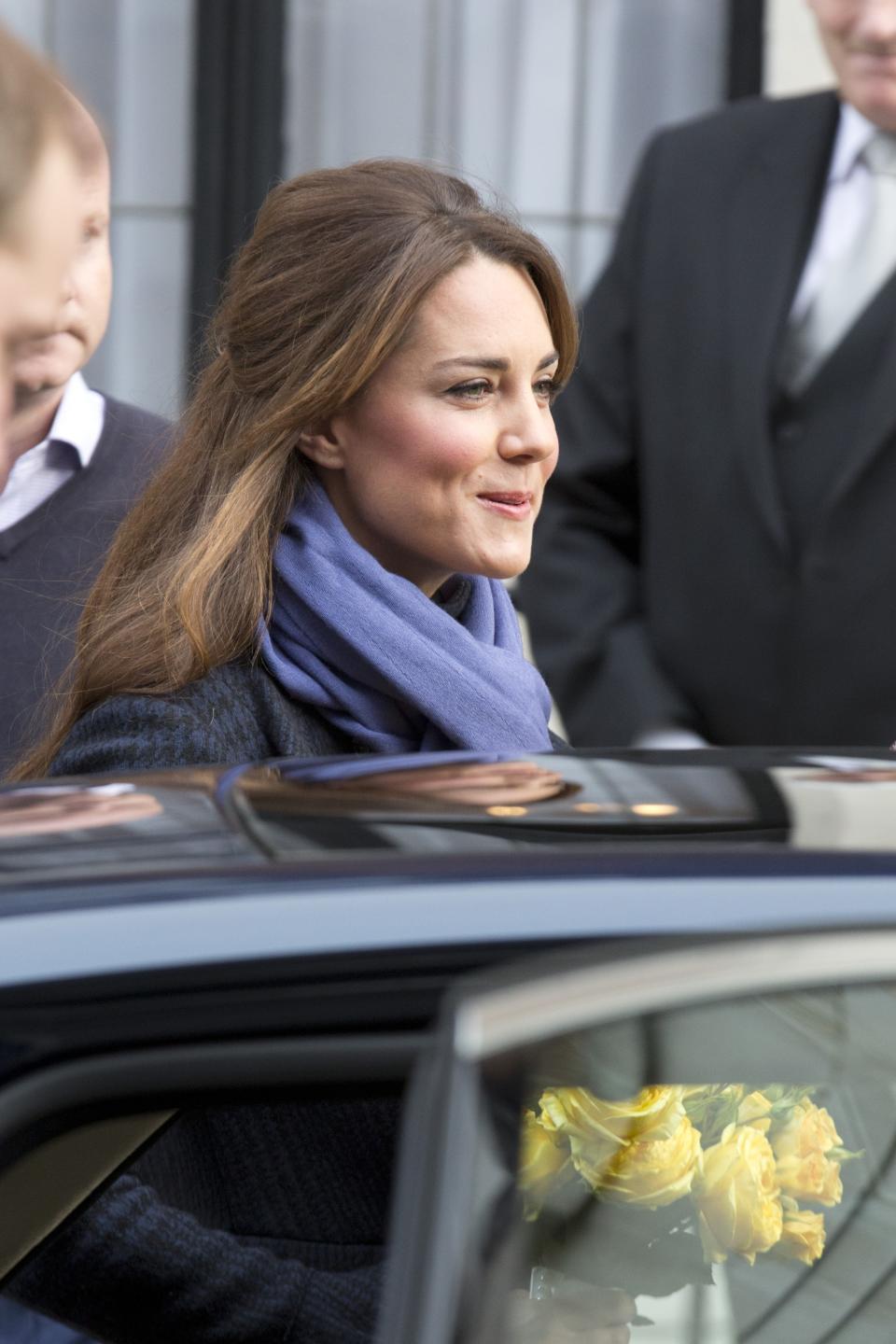 LONDON, ENGLAND - DECEMBER 06: Catherine, Duchess of Cambridge and Prince William, Duke of Cambridge leave the King Edward VII hospital where she has been treated for hyperemesis gravidarum, extreme morning sickness at King Edward VII Hospital on December 6, 2012 in London, England. (Photo by Julian Parker/UK Press via Getty Images)