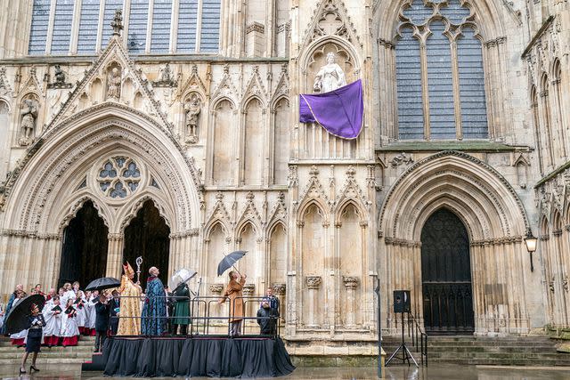 <p>Danny Lawson - WPA Pool/Getty Images</p> King Charles, next to Quee Camilla, unveils the statue of Queen Elizabeth II outside York Minster.