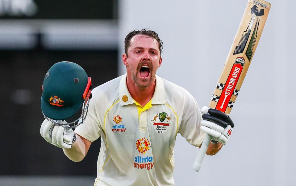 Travis Head celebrates reaching his century - AFP