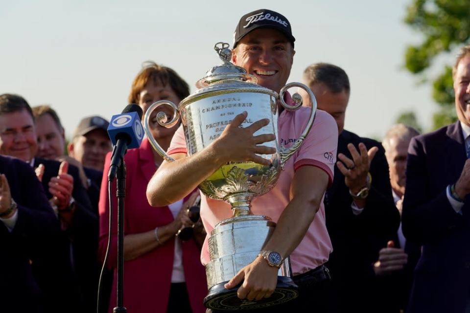 Justin Thomas holds the Wanamaker Trophy after winning the PGA Championship at Southern Hills Country Club (Eric Gay/AP) (AP)