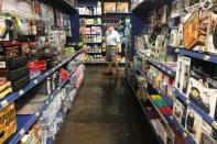 A man shops at a store thats sells parts and accessories for Recreational Vehicles (RVs) in Orlando