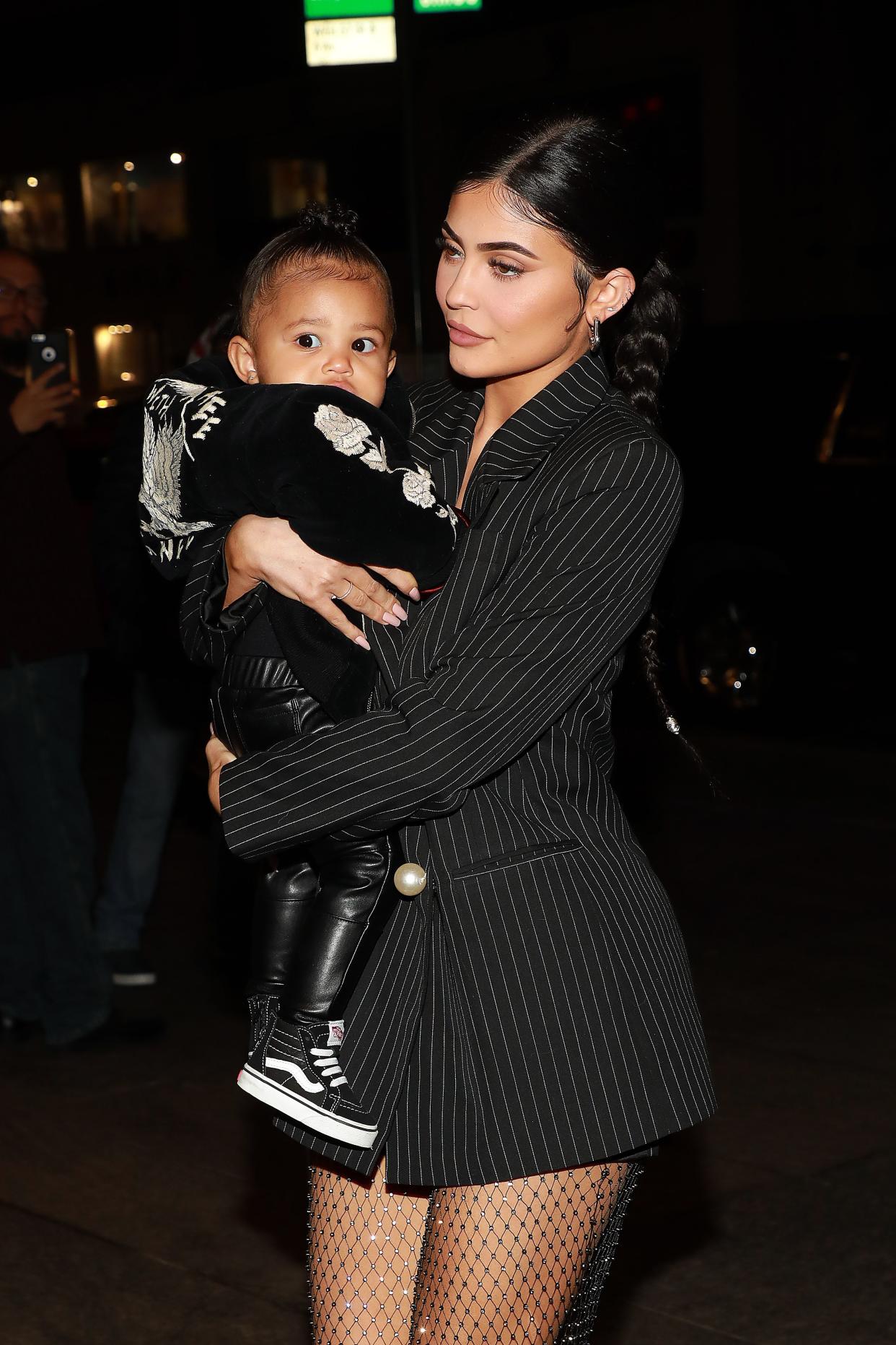 Kylie Jenner holding daughter Stormi Webster