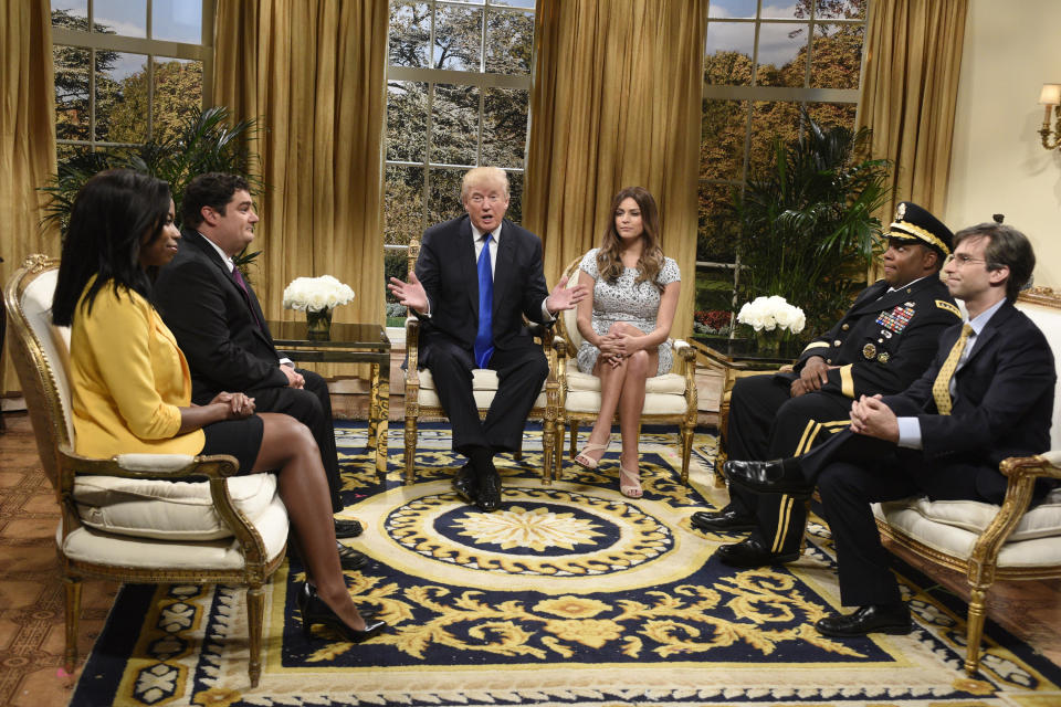 SATURDAY NIGHT LIVE -- 'Donald Trump' Episode 1687 -- Pictured: (l-r) Sasheer Zamata as Omarosa, Bobby Moynihan, Donald Trump as the President of The United States, Cecily Strong as Melania Trump, Kenan Thompson, and Kyle Mooney during the 'White House' sketch on November 7, 2015 -- (Photo by: Dana Edelson/NBC/NBCU Photo Bank via Getty Images)