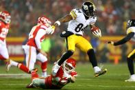 <p>Wide receiver Antonio Brown #84 of the Pittsburgh Steelers runs the ball after catching a pass against defensive back Daniel Sorensen #49 of the Kansas City Chiefs during the first half in the AFC Divisional Playoff game at Arrowhead Stadium on January 15, 2017 in Kansas City, Missouri. (Photo by Dilip Vishwanat/Getty Images) </p>