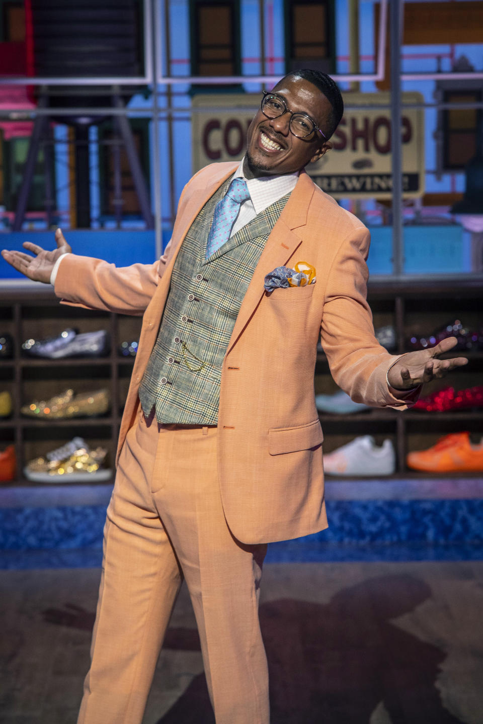 Talk show host Nick Cannon poses for a portrait on the set of "Nick Cannon" at Metropolitan Studios in New York on Sept. 16, 2021. His nationally syndicated daytime talk show premieres Sept. 27 on Fox Television Stations. (Photo by Andy Kropa/Invision/AP)