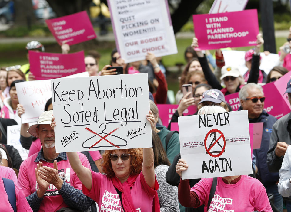 People gather at the state Capitol to rally in support of abortion rights, Tuesday, May 21, 2019, in Sacramento, Calif. (AP Photo/Rich Pedroncelli)