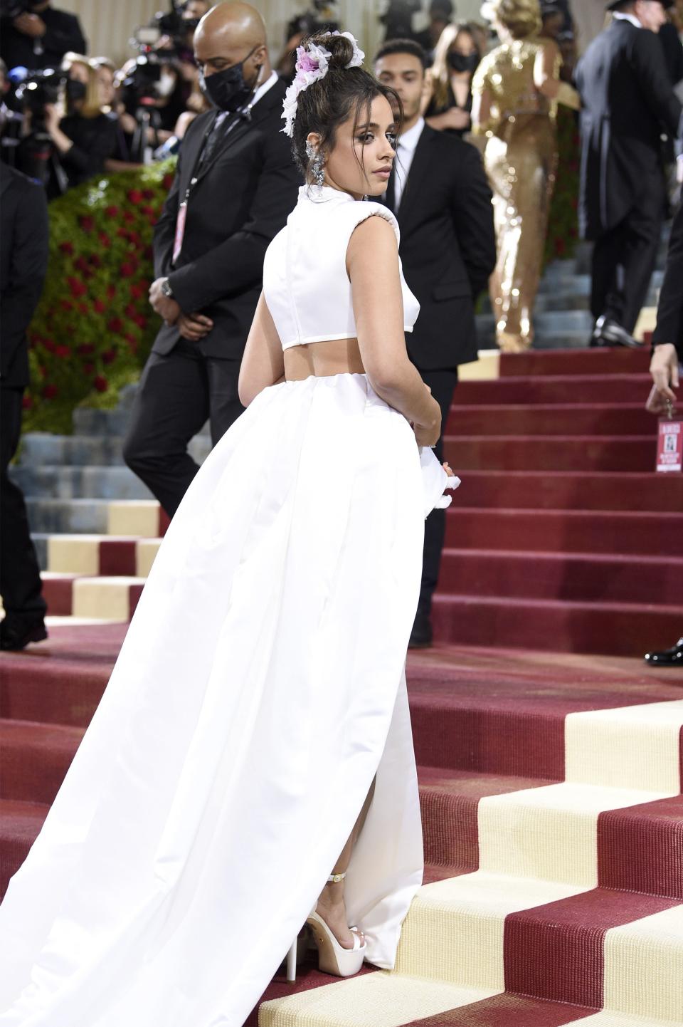 Camila Cabello walks up stairs for photo at Met Gala