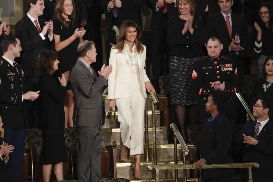 The first lady wore a white pantsuit of her own at this year’s State of the Union address. (Photo: J. Scott Applewhite/AP)