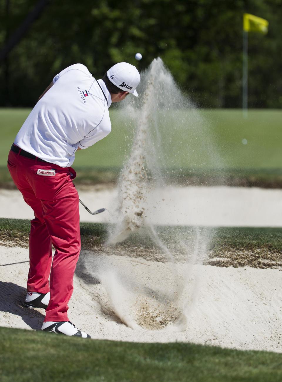 Keegan Bradley hits out of a bunker on the eighth hole during the second round of the Houston Open golf tournament on Friday, April 4, 2014, in Humble, Texas. (AP Photo/Patric Schneider)