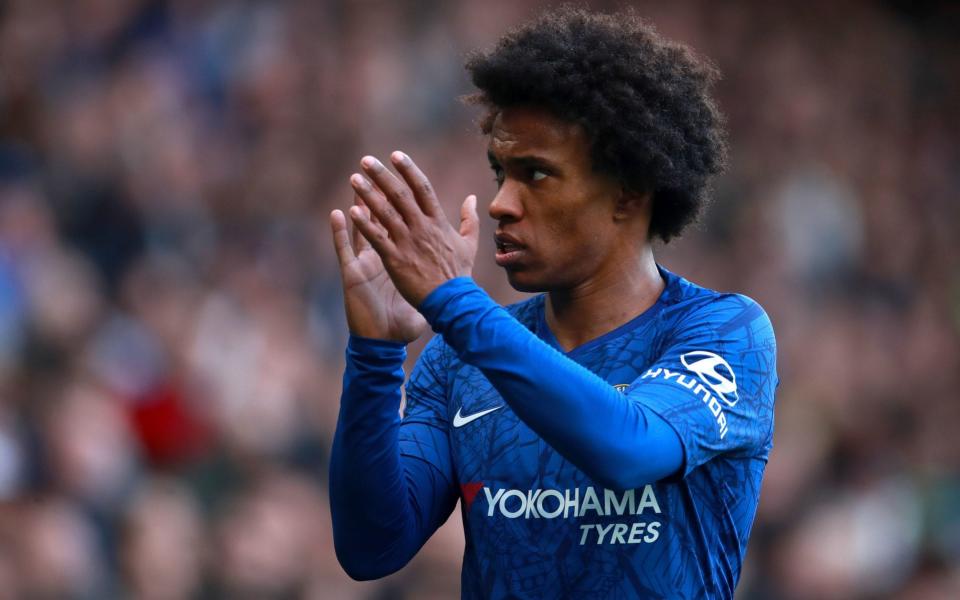 Willian applauding Chelsea's fans - Willian confirms Chelsea departure as expected Arsenal move progresses - PA