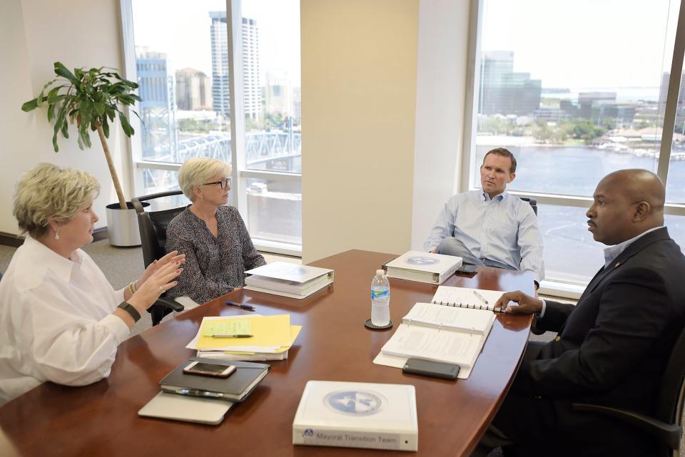 In 2015 then Mayor-elect Lenny Curry, top, meets with several members of his transition team: (from left) policy director Susie Wiles, co-chairwoman Rena Coughlin and co-chairman Charles Moreland.