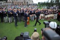 Jul 31, 2016; Springfield, NJ, USA; Jimmy Walker shakes the hand of an PGA representative before receiving the Championship trophy at end of the Sunday round of the 2016 PGA Championship golf tournament at Baltusrol GC - Lower Course. Mandatory Credit: Eric Sucar-USA TODAY Sports