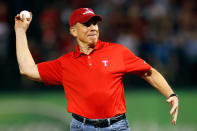 ARLINGTON, TX - OCTOBER 24: Dallas Cowboys Hall of Fame quarterback Roger Staubach throws out the ceremonial first pitch prior to Game Five of the MLB World Series between the St. Louis Cardinals and the Texas Rangers at Rangers Ballpark in Arlington on October 24, 2011 in Arlington, Texas. (Photo by Tom Pennington/Getty Images)