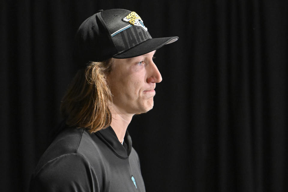 Jacksonville Jaguars quarterback Trevor Lawrence answers questions during a news conference an NFL football game Sunday, Dec. 24, 2023, in Tampa, Fla. (AP Photo/Jason Behnken)