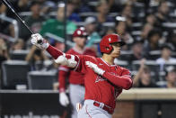 Los Angeles Angels' Shohei Ohtani, of Japan, follows through on a double during the third inning of a baseball game against the New York Mets, Friday, Aug. 25, 2023, in New York. (AP Photo/Frank Franklin II)