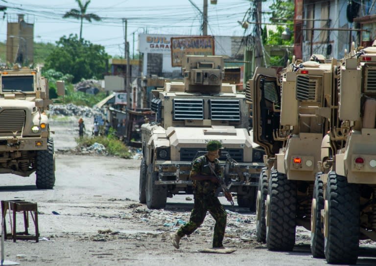 La policía keniana se despliega cerca del palacio nacional de Haití, en Puerto Príncipe, el 17 de julio de 2024 (Clarens Siffroy)