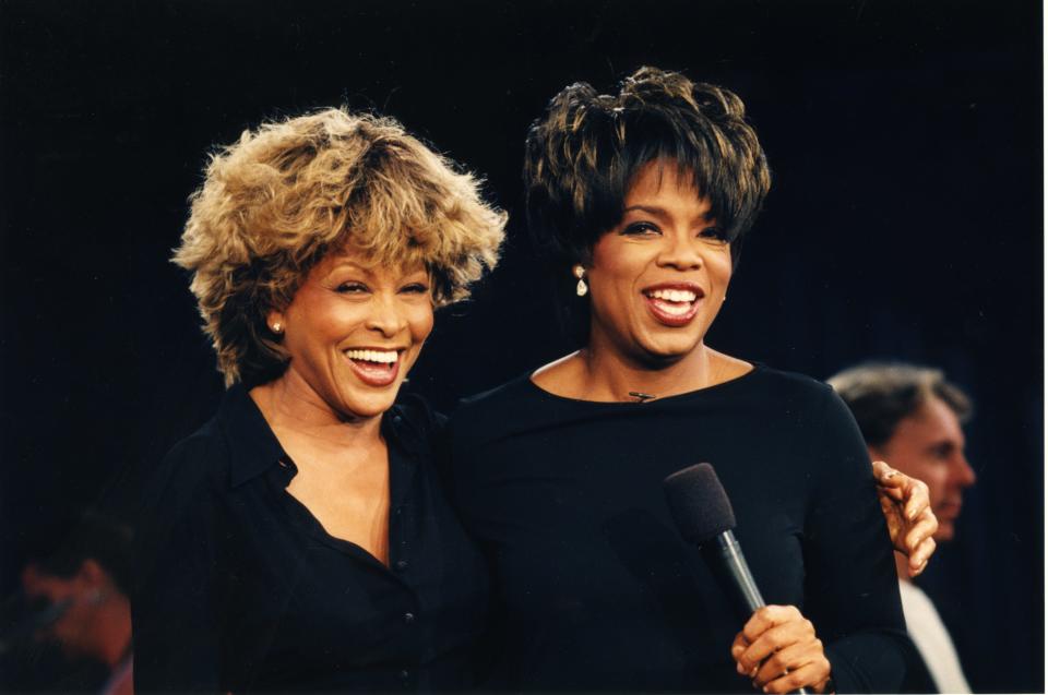 Tina Turner, left, and Oprah Winfrey in 1997.