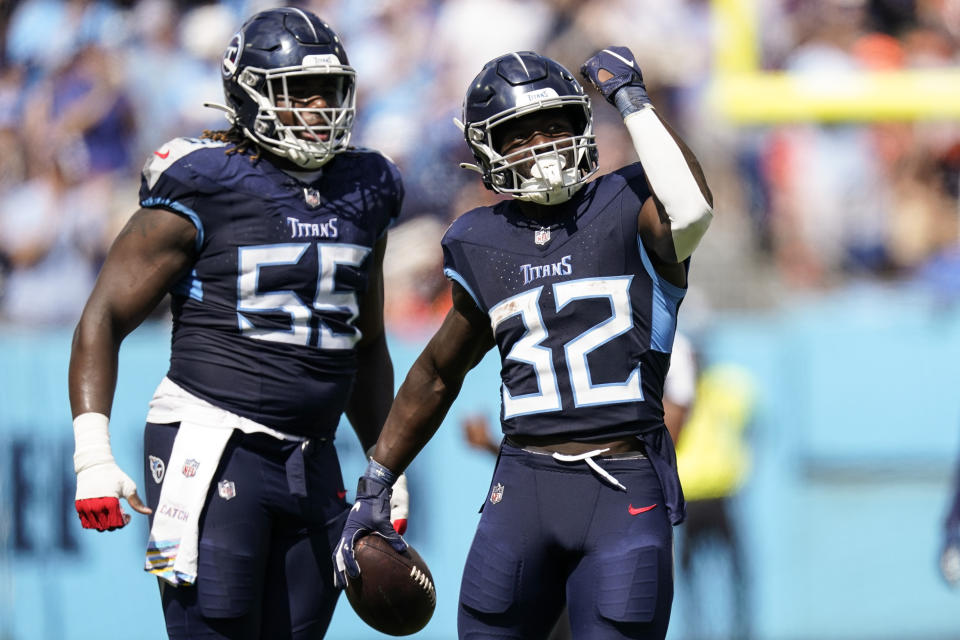 Tennessee Titans running back Tyjae Spears (32) celebrates hios first down run against the Cincinnati Bengals during the first half of an NFL football game, Sunday, Oct. 1, 2023, in Nashville, Tenn. (AP Photo/George Walker IV)