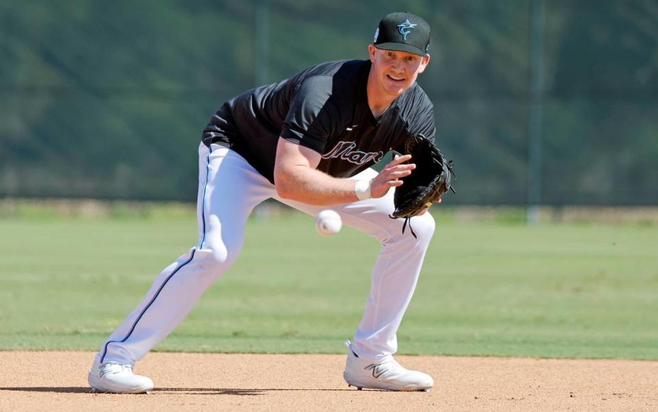 Miami Marlins first baseman Garrett Cooper goes through a fielding drill during spring training at Roger Dean Chevrolet Stadium in Jupiter, Florida on Tuesday, February 21, 2023.