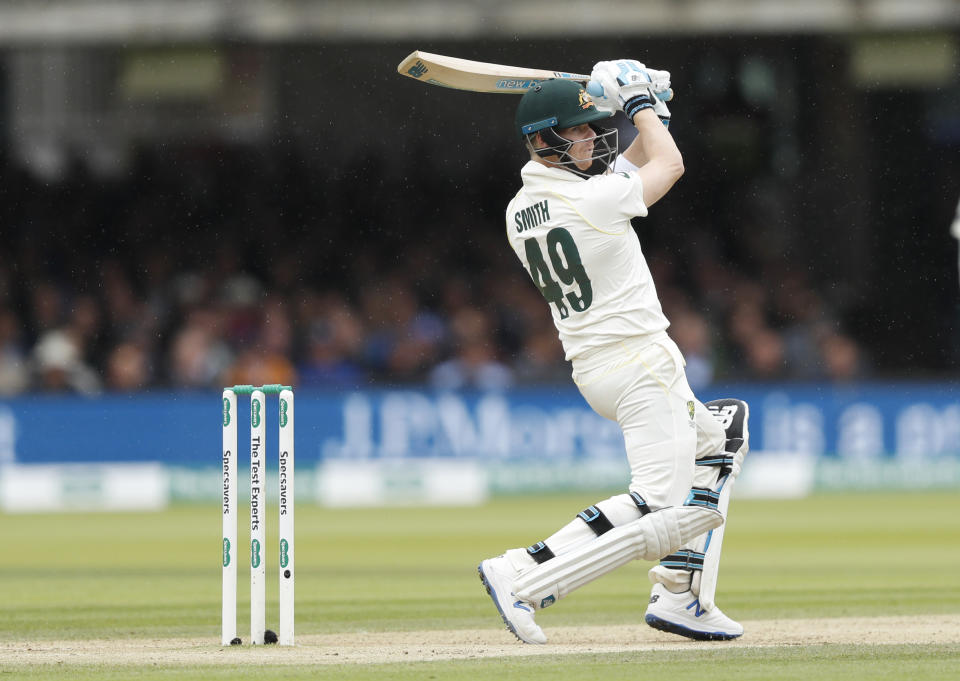 Australia's Steve Smith plays a shot off the bowling of England's Chris Woakes on day three of the 2nd Ashes Test cricket match between England and Australia at Lord's cricket ground in London, Friday, Aug. 16, 2019. (AP Photo/Alastair Grant)