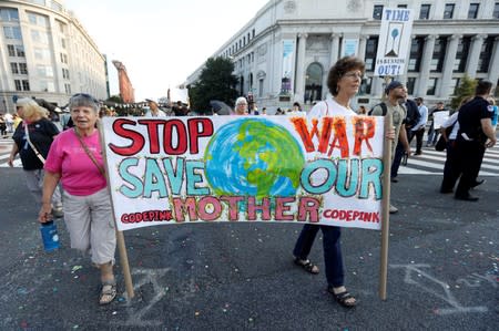 Environmental activists block traffic as part of climate change protest in Washington