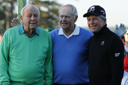 Jack Nicklaus of the U.S. and fellow former Masters champions Arnold Palmer of the U.S. (L) and Gary Player of South Africa pose for a picture after the ceremonial start of the Masters golf tournament at the Augusta National Golf Club in Augusta, Georgia April 10, 2014. REUTERS/Mike Blake