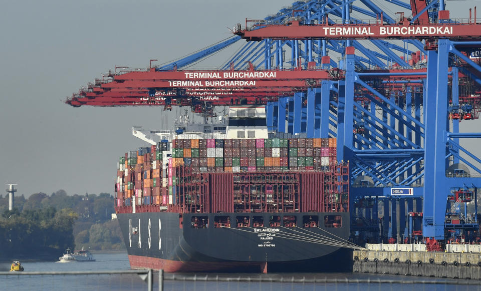 FILE - In this Monday, Oct. 15, 2018 file photo, a container ship is loaded at the harbor in Hamburg, Germany. The United States is considering putting tariffs on $11 billion in EU goods per year to offset what it says are unfair European subsidies for planemaker Airbus. While the size of the potential tariffs is relatively small compared with the hundreds of billions of goods the U.S. and China are taxing in their trade war, it suggests a breakdown in talks with the EU over trade. (AP Photo/Martin Meissner, file)