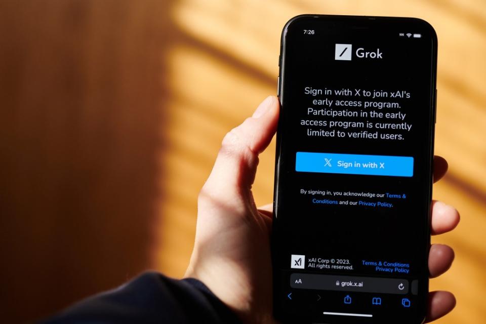 The Grok website on a smartphone arranged in New York, US, on Wednesday, Nov. 8, 2023