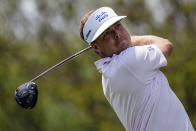 Keith Mitchell watches his tee shot on the second hole during the third round of the Wells Fargo Championship golf tournament at Quail Hollow on Saturday, May 8, 2021, in Charlotte, N.C. (AP Photo/Jacob Kupferman)