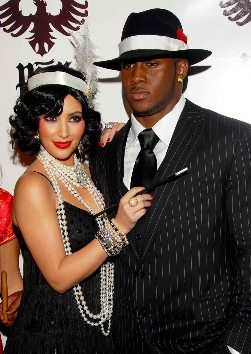 Kimberly Kardashian and NFL player Reggie Bush attends the Pur Jeans Halloween Bash at STK on October 31, 2008 in Los Angeles, California