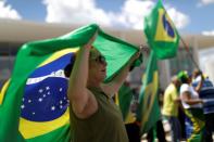 Supporters of far-right Brazilian President Jair Bolsonaro protest against the recommendations for social isolation of the governor of Brasilia during the coronavirus disease (COVID-19) outbreak, in Brasilia