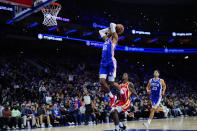 Philadelphia 76ers' Matisse Thybulle (22) goes up for a dunk during the second half of an NBA basketball game against the Atlanta Hawks, Saturday, Oct. 30, 2021, in Philadelphia. (AP Photo/Matt Slocum)