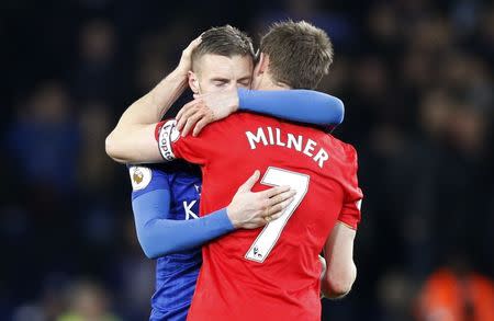 Britain Football Soccer - Leicester City v Liverpool - Premier League - King Power Stadium - 27/2/17 Leicester City's Jamie Vardy hugs Liverpool's James Milner after the game Reuters / Darren Staples Livepic