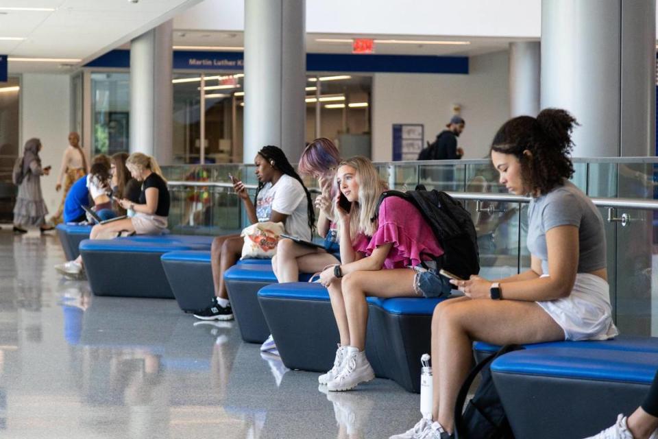 Students gather within several communal areas of UK’s Gatton Student Center between classes, August 21, 2023.