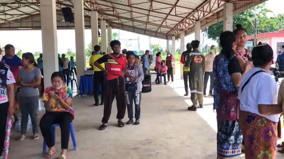 This frame grab from video footage by Thai PBS made available via AFPTV and taken on October 6, 2022 shows people gathered outside the daycare centre in  Nongbua Lamphu (AFPTV/AFP via Getty Images)