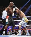 Floyd Mayweather Jr., left, squares off against Marcos Maidana, from Argentina, in their WBC-WBA welterweight title boxing fight Saturday, May 3, 2014, in Las Vegas. (AP Photo/Eric Jamison)