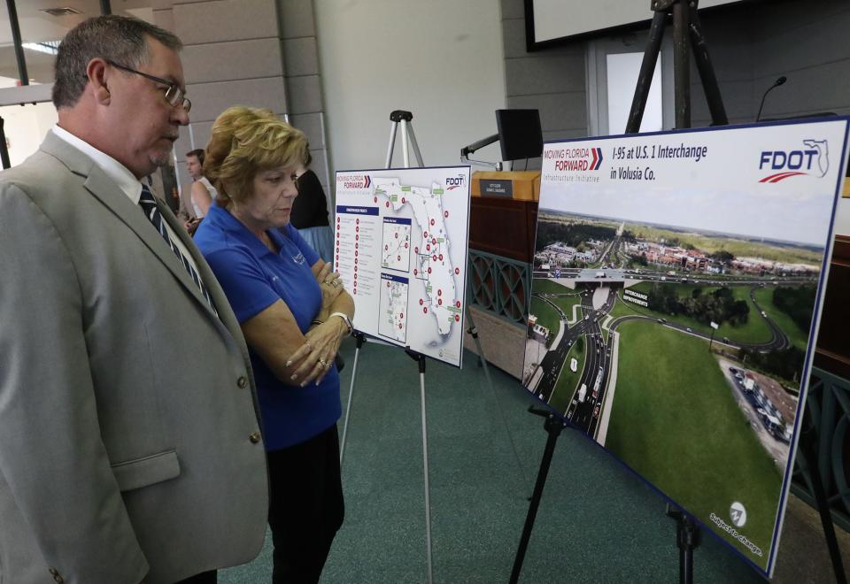 Residents look over plans for the new Interstate 95/U.S. 1 interchange at Ormond Beach City Hall on Tuesday.