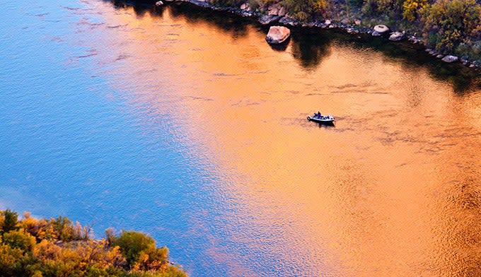 Fishing boat on the Colorado River at the beginning of the Grand Canyon