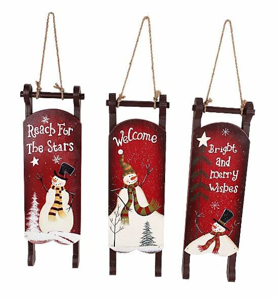 Snowman Christmas 3 Piece Hand Painted Sleigh Set. Image via Wayfair.