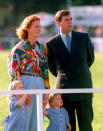 <p>The then Duke and Duchess of York pictured with a two-year-old Eugenie and big sis Beatrice back in 1992. (We’re loving Fergie’s retro blouse and high waisted jeans combo!) [Photo: PA Images] </p>