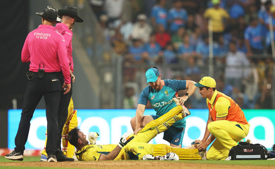 Glenn Maxwell, pictured here battling cramps during his historic innings at the Cricket World Cup. 