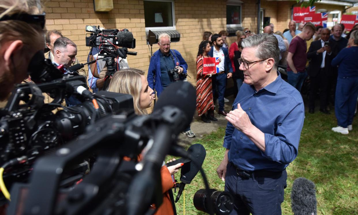 <span>Keir Starmer talking to members of the media in Grays, Essex, this month.</span><span>Photograph: John Keeble/Getty Images</span>